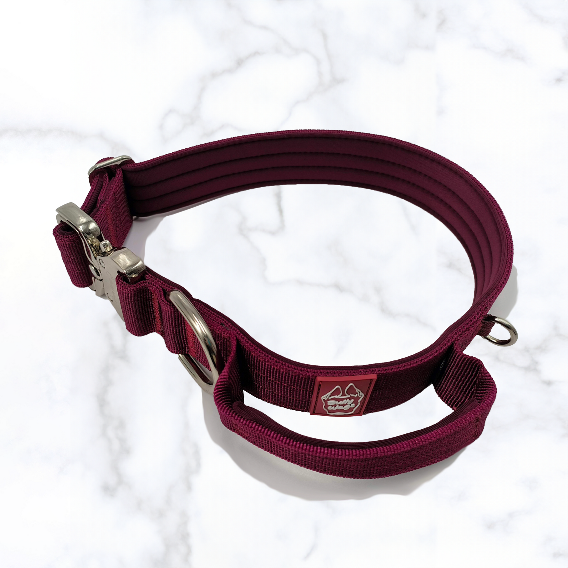 Three tactical dog collars with handles displayed in red.