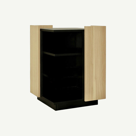 Wooden cabinet with black glass front on a white background