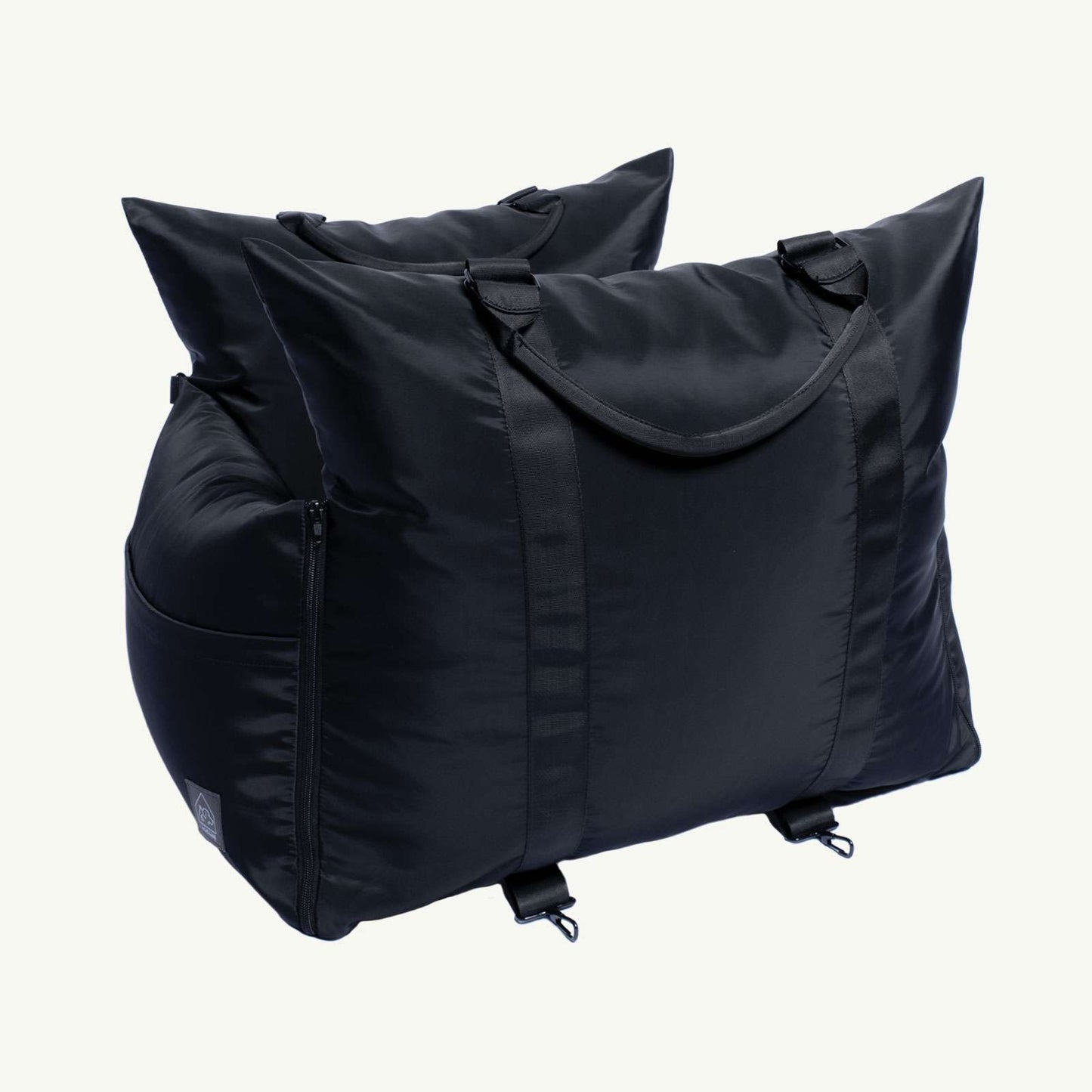 Two black bicycle carrier bags on a white background