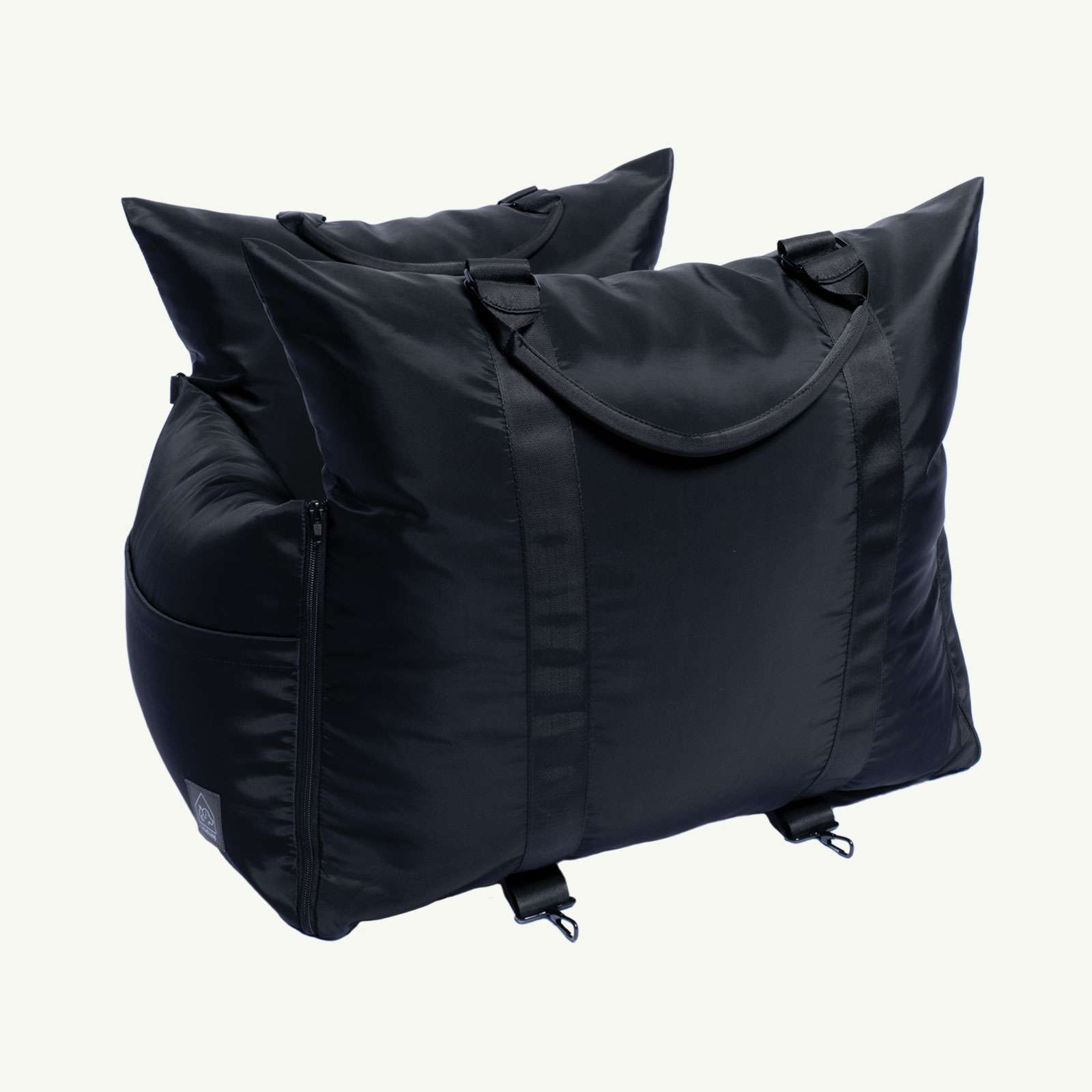 Two black bicycle carrier bags on a white background