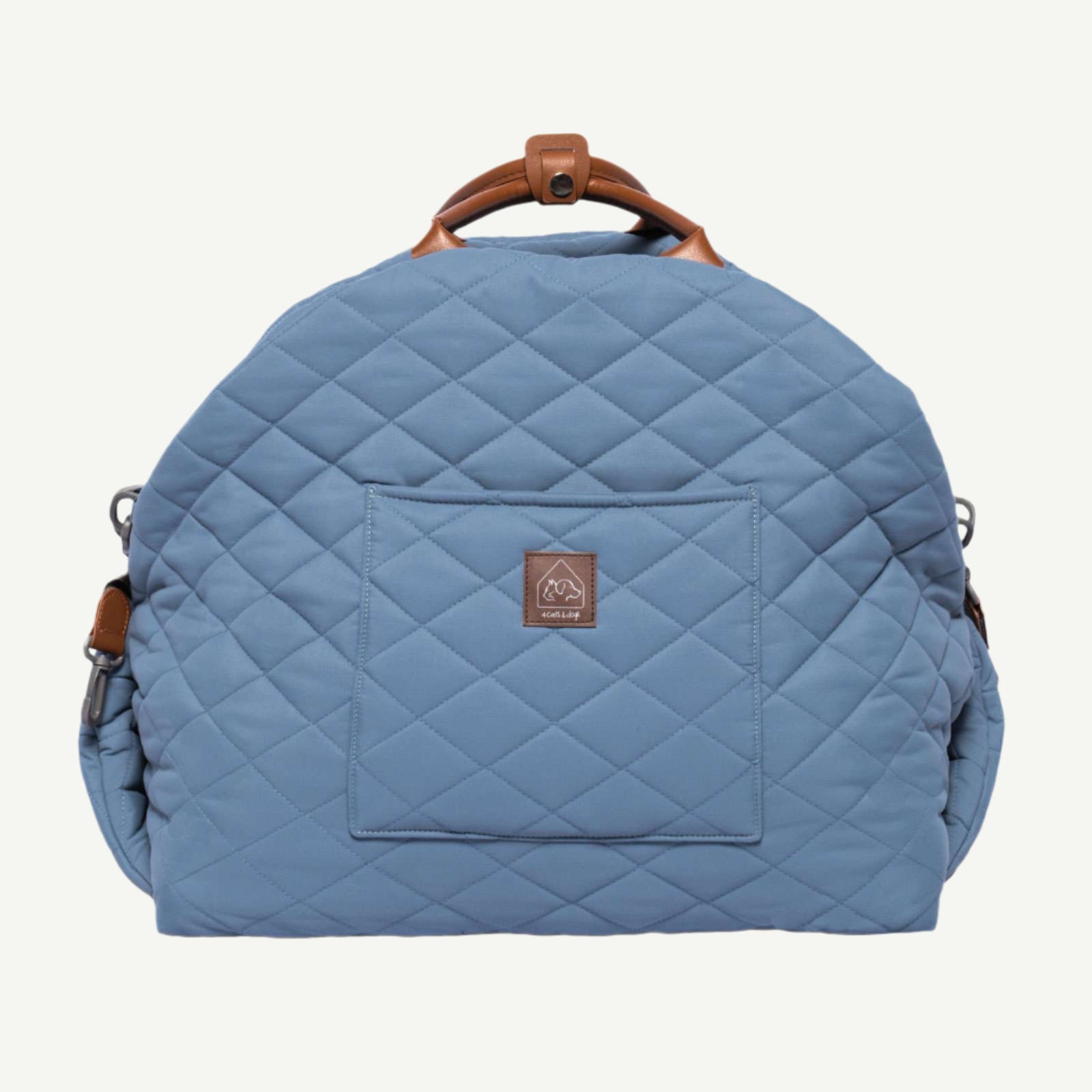 Blue quilted backpack with brown handle and accents on a white background