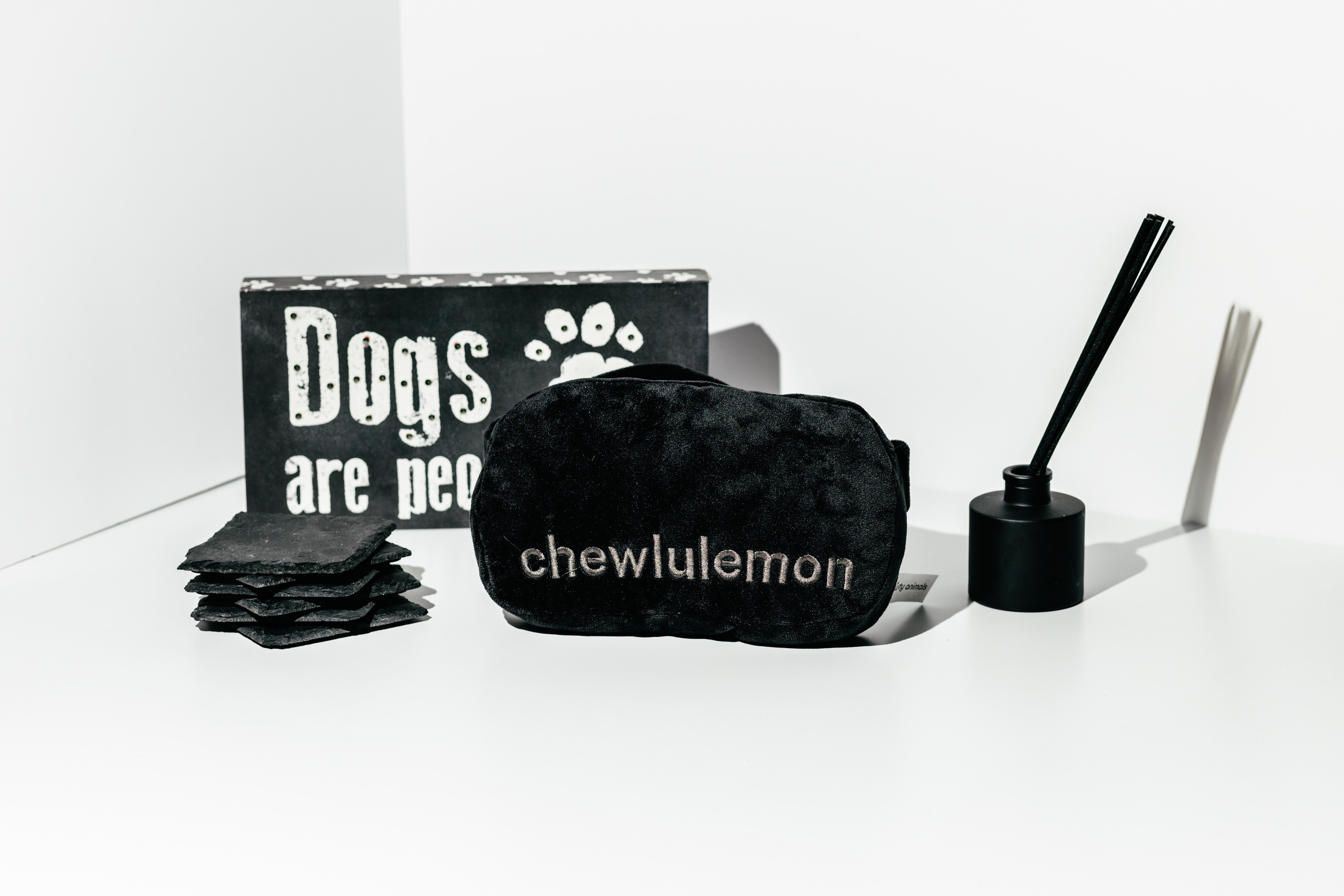 Black product with 'chewlulemon' branding on a white background