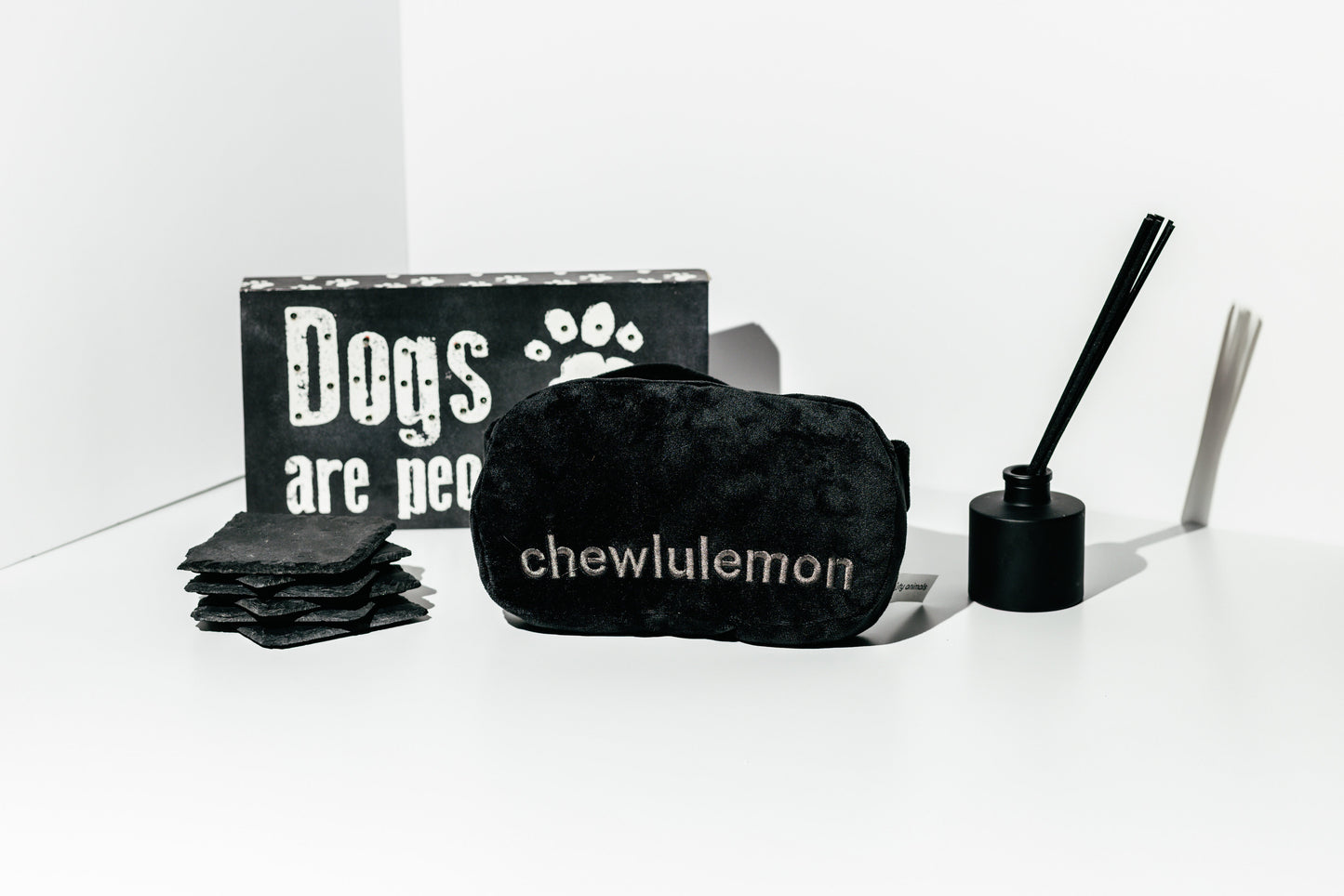 Black product with 'chewlulemon' branding on a white background