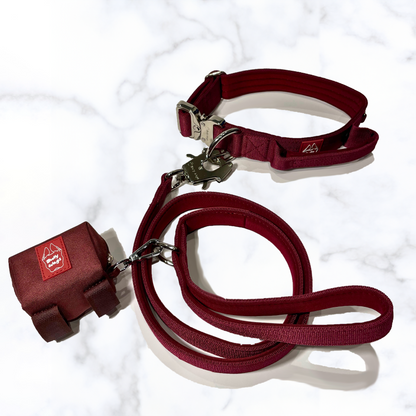 Tactical Collar with Handle, Leash, & Waste Bag Dispenser Set dog collar & leash from Floof Pet Products on a neutral background