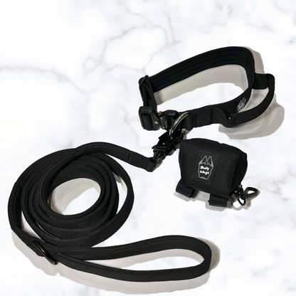 Tactical Collar with Handle, Leash, & Waste Bag Dispenser Set dog collar & leash from Floof Pet Products on a neutral background