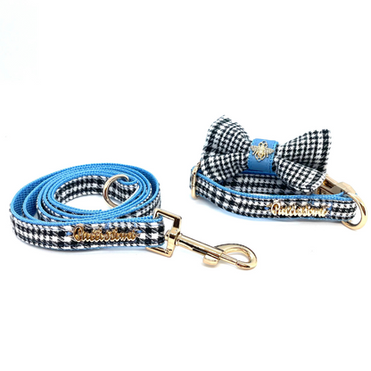 Dog leash and bow tie set with blue and black checkered pattern on a white background