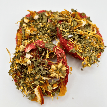 Two dried herb wreaths on a white background