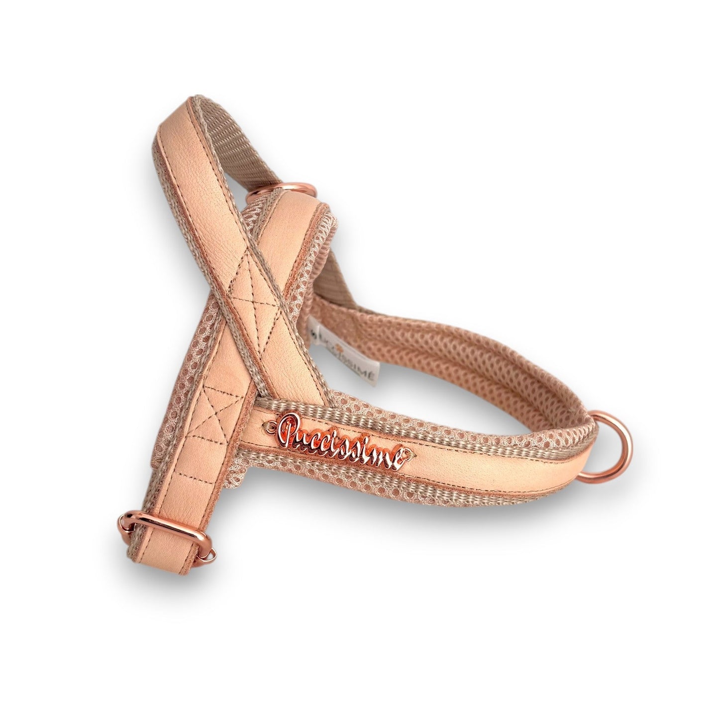 Rose gold dog harness with 'Narissimi' branding on a white background