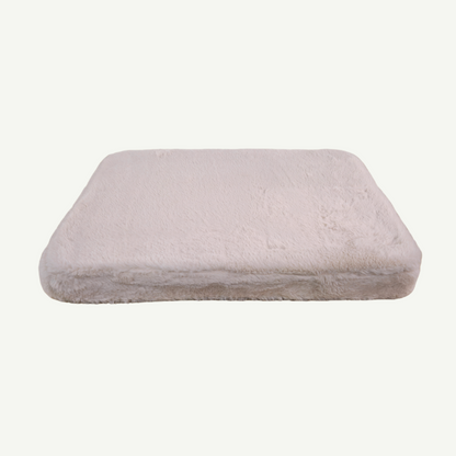 Rectangular pink pet cushion on a white background