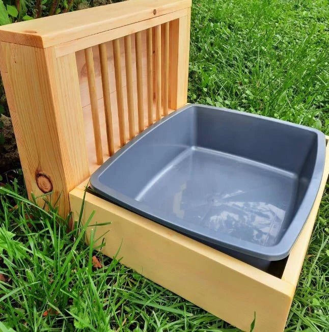 XL wooden box feeder with dowels enclosure on grass