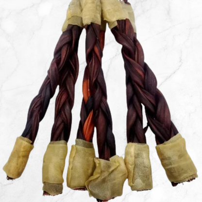 Set of braided collagen sticks with beige ends on a white background
