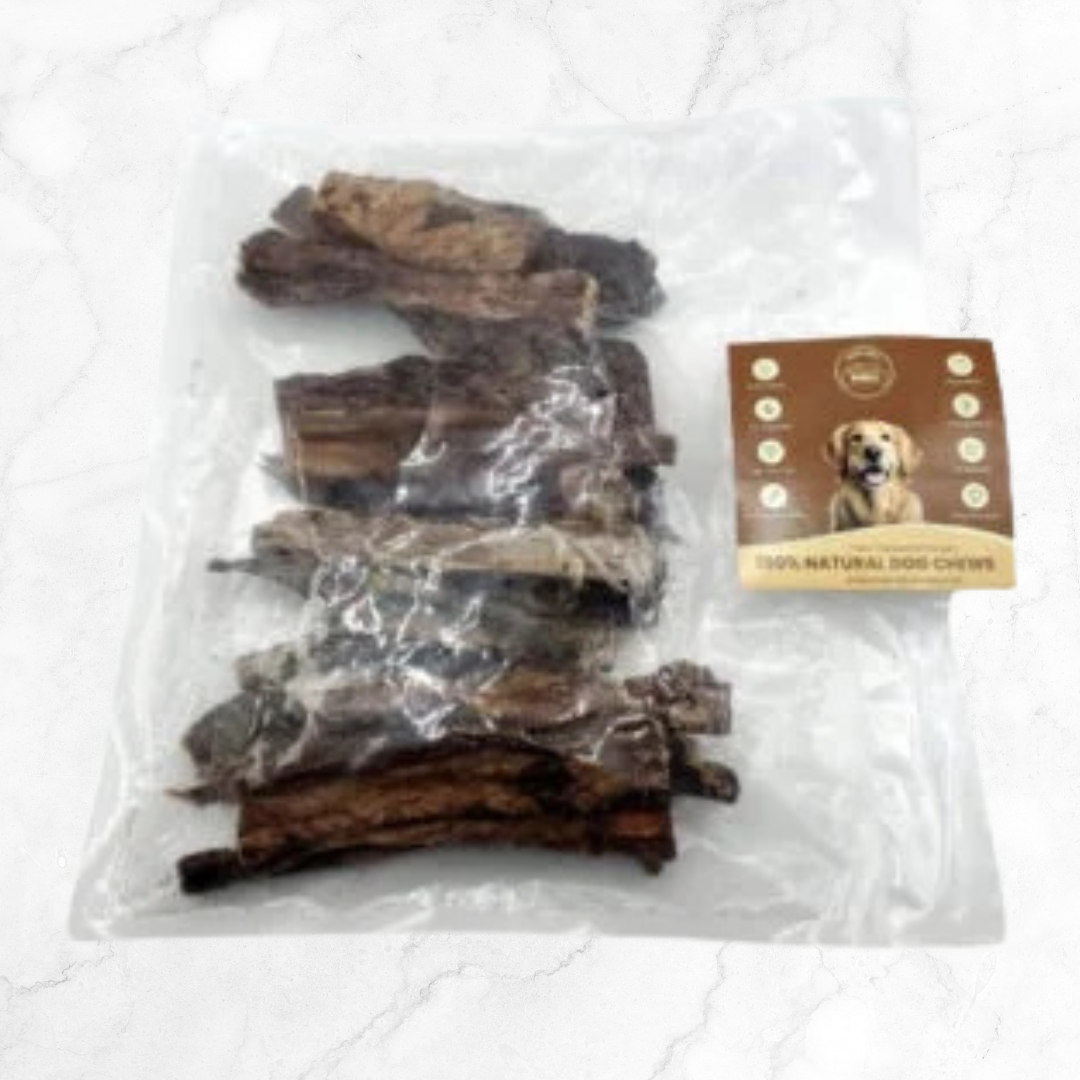 Dog chews in a clear plastic bag with a branded label on a white background