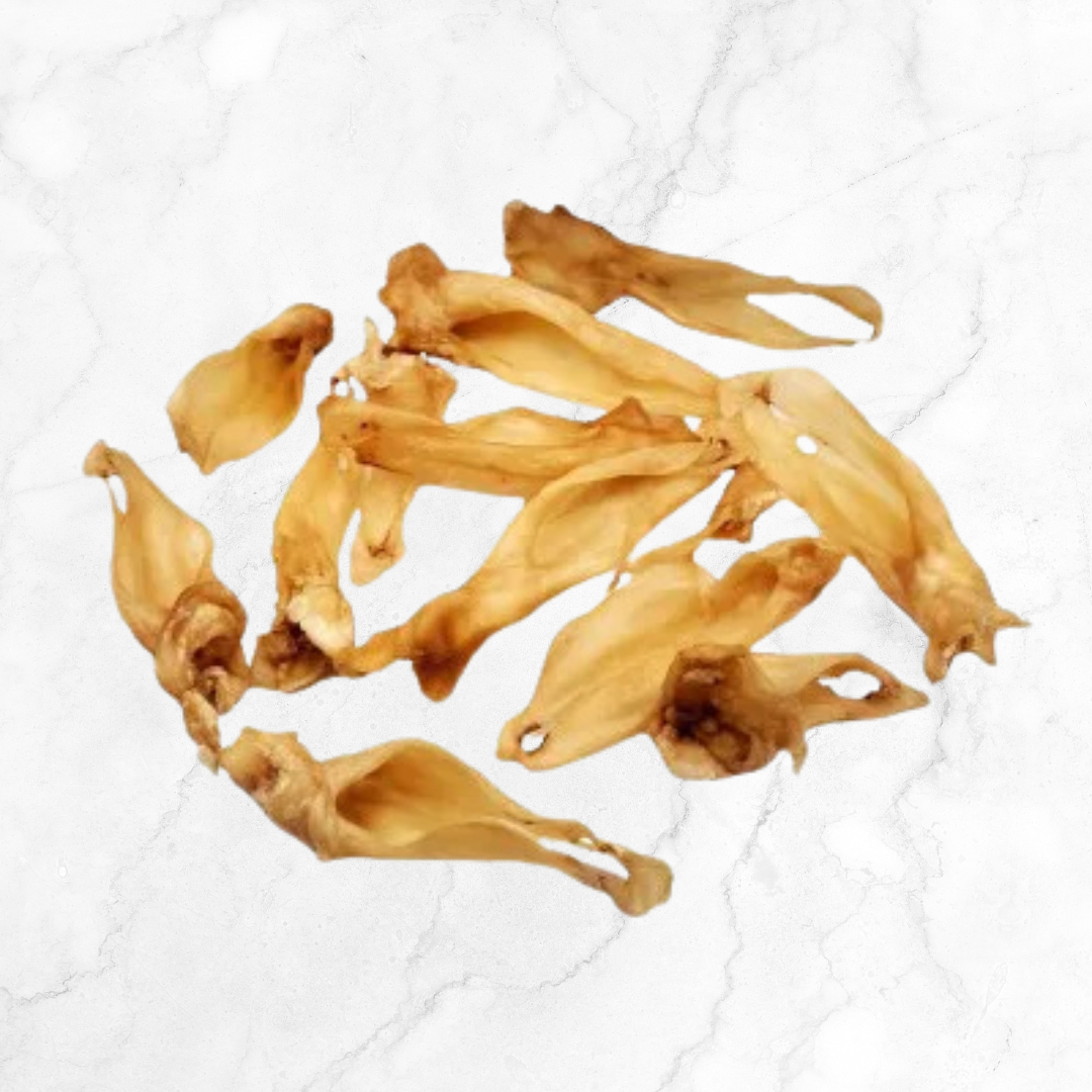 Dried goat ear pieces on a white background