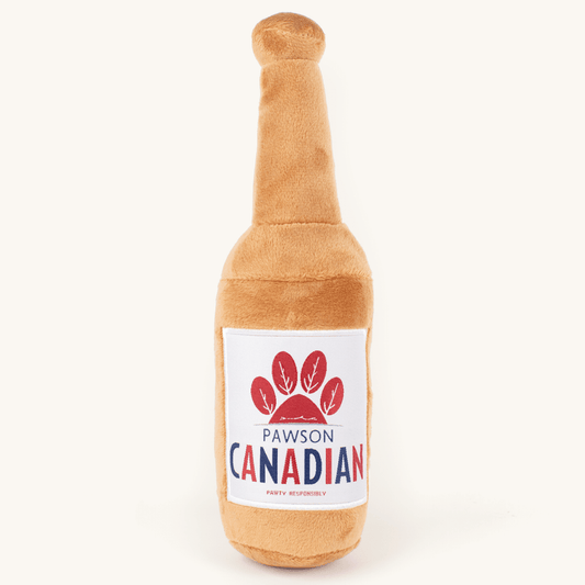 Plush bottle toy with 'Pawson Canadian' label on a white background