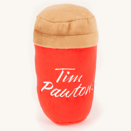 Red plush cup with beige lid featuring 'Tim Pawtan' on a white background