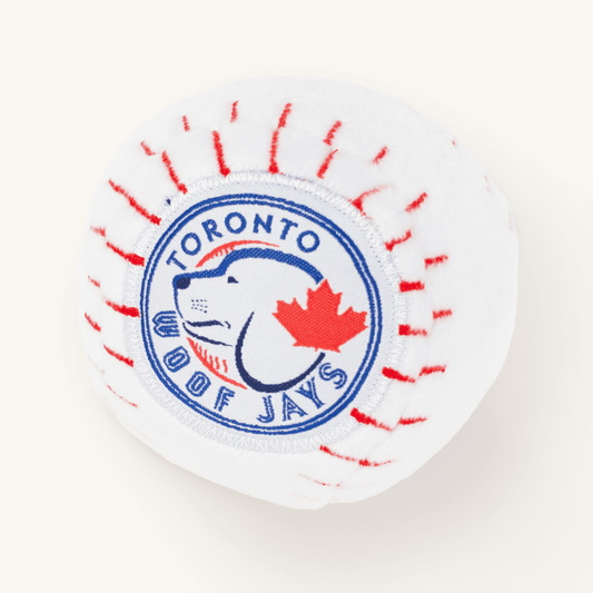 Circular patch with 'Toronto Woof Jays' text and a dog and leaf design on a white background