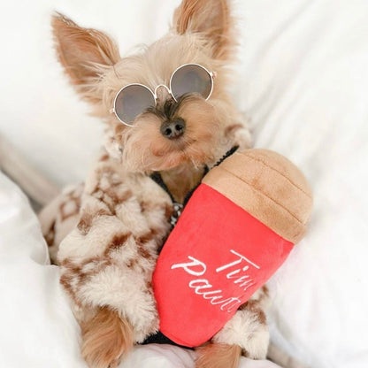 Dog wearing sunglasses and a red bandana with 'Tim Pawt' text on a white background