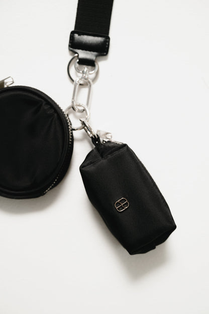 Black pouch with a strap on a white background