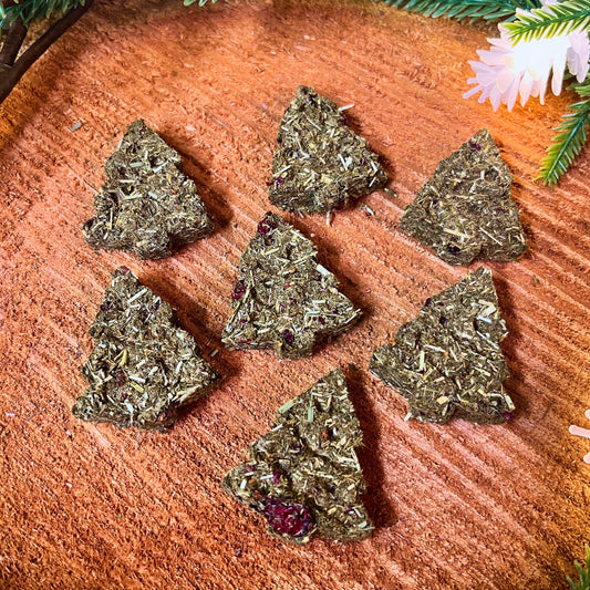 Oh Christmas Tree Hay Bites small pet treats from Floof Pet Products on a neutral background