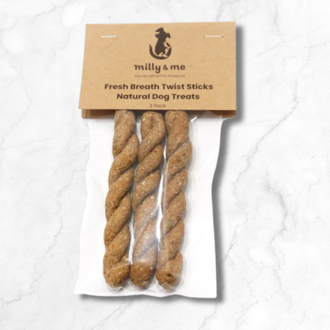 Pack of 'Fresh Breath Twist Sticks' natural dog treats by milly & me on a white background