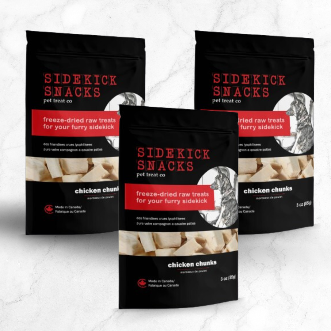 Three packages of Sidekick Snacks pet treat co with chicken chunks on a white background